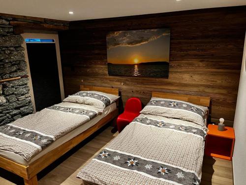 מיטה או מיטות בחדר ב-Ferienwohnung Casa Bolivia