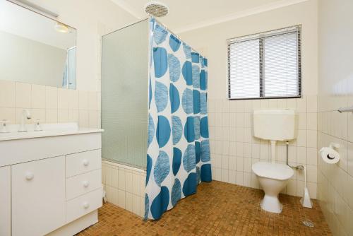 a bathroom with a toilet and a sink at South Seas - Port Elliot Beachfront Apt - Wifi in Port Elliot