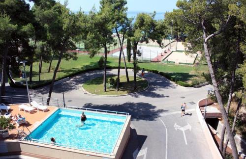 an overhead view of a swimming pool at a resort at Luxe apartment Del Mare in Podstrana