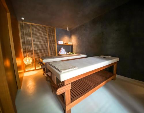 a bathroom with a bath tub in a room at Pilos Suites in Turunc