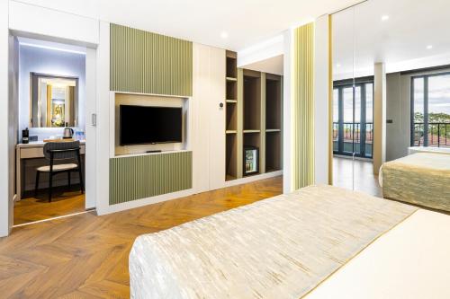 Postel nebo postele na pokoji v ubytování Rast Hotel Sultanahmet