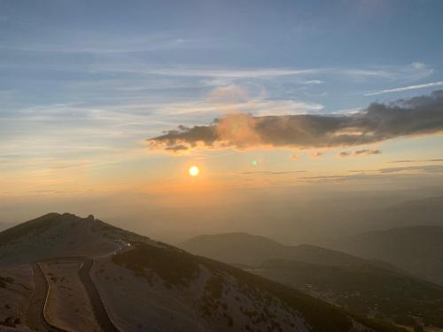 a view of the sunset from the top of a mountain at BROSSARD in Cavaillon