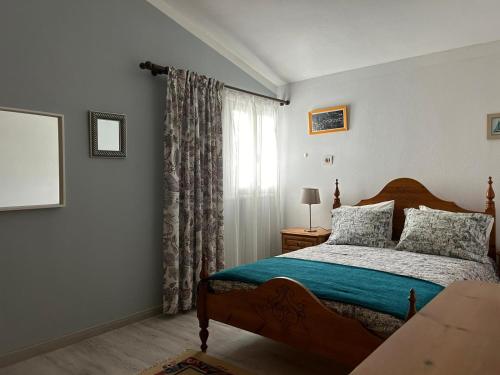 Ένα ή περισσότερα κρεβάτια σε δωμάτιο στο Casa La Oliva 1