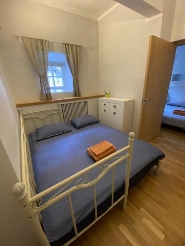 מיטה או מיטות בחדר ב-Kivivete Apartments
