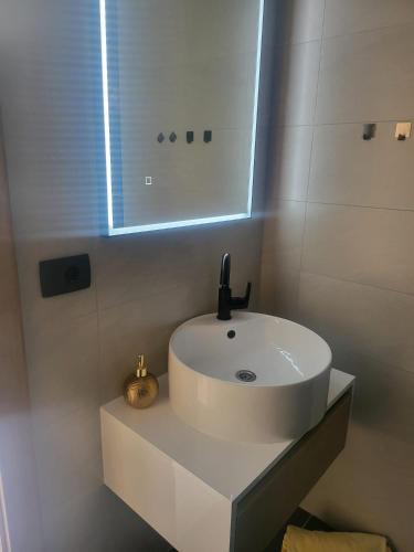 Ένα μπάνιο στο Apartmani Brium