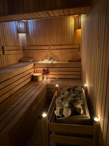a sauna with a bed and lights in it at Far Life Hotel in Antalya