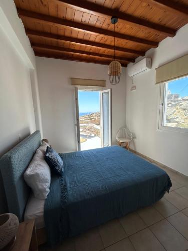 Ένα ή περισσότερα κρεβάτια σε δωμάτιο στο Agyra House