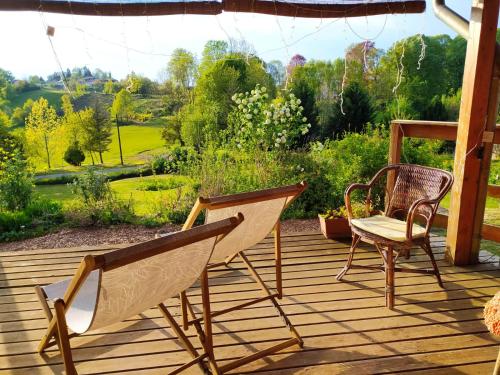 Room with en suite bathroom in cosy wooden house