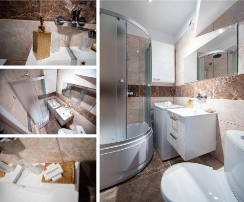 a bathroom with a sink and a toilet and a shower at Apartament 1 blisko Atlas Areny, ZOO oraz Orientarium in Łódź