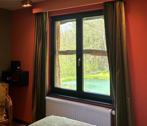 Katil atau katil-katil dalam bilik di B&B Les Oiseaux de Passage