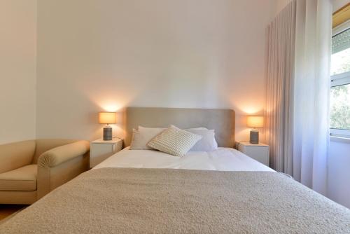 Katil atau katil-katil dalam bilik di Cascais sea view apartment
