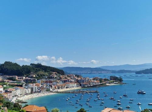 a view of a harbor with boats in the water at El paraíso in Raxo