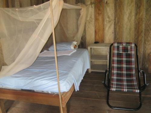 Krevet ili kreveti u jedinici u okviru objekta Tahuayo Lodge Expeditions