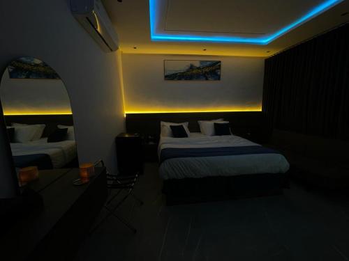 Letto o letti in una camera di الرياض الفندقية Hotel 'AlRiyadh