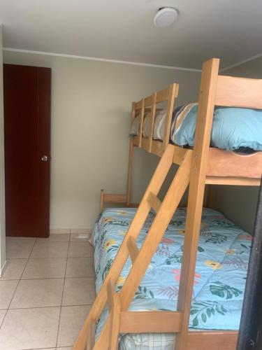 Ένα ή περισσότερα κρεβάτια σε δωμάτιο στο Apartamento LA ALBORADA para 7 con cochera
