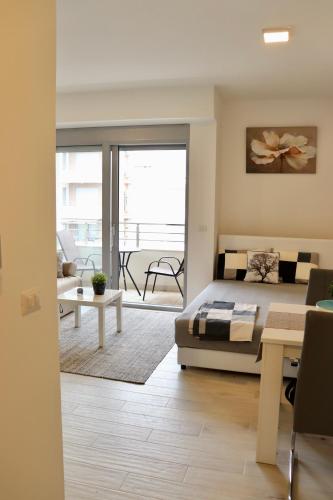 Postel nebo postele na pokoji v ubytování Jugo Apartment