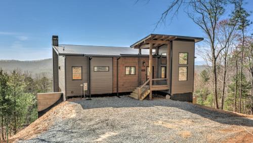 a tiny house in the middle of the woods at Boundless Views in Mashburn Mill
