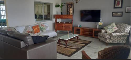 Un lugar para sentarse en Seaview Self Catering
