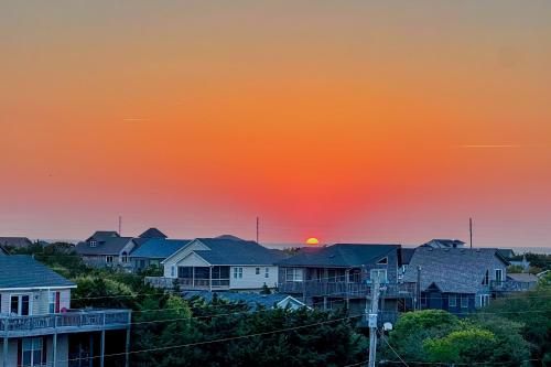 別荘または周辺から見られる日の出または日の入りの景色