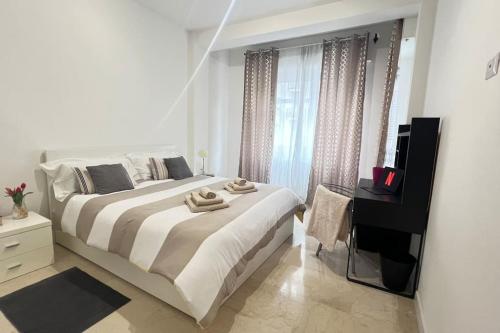 Katil atau katil-katil dalam bilik di New and elegant apartment on the Navigli Netflix e Disney