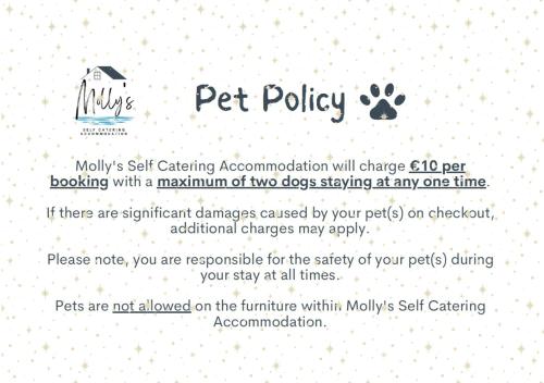 página de una política de mascotas con una huella de pata en Molly's Self Catering Accommodation, en Cavan