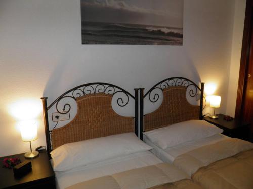 Ένα ή περισσότερα κρεβάτια σε δωμάτιο στο Apartamento Los Pescadores