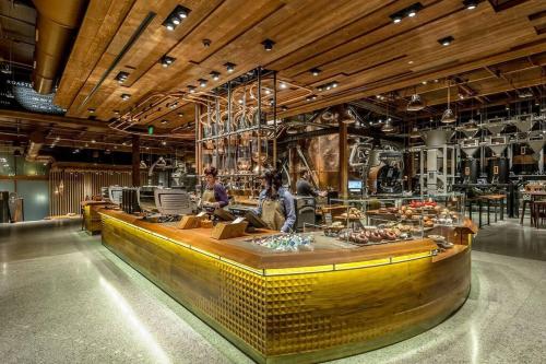 a counter in a store with a person standing at it at Luxury Downtown Studio King Bed City View in Seattle