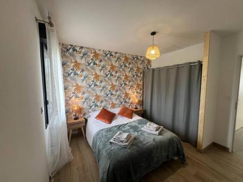 Cama o camas de una habitación en le cocon vézerontin