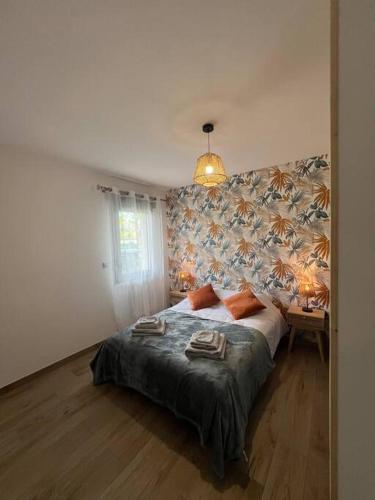 Cama o camas de una habitación en le cocon vézerontin