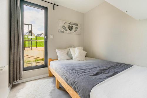 เตียงในห้องที่ Cozy Houseboat in Zwartsluis