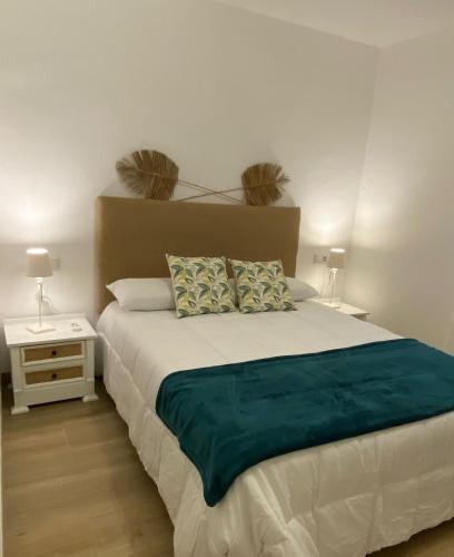 Postel nebo postele na pokoji v ubytování Habitaciones con baño sin cocina ni salón Sierra de las Villas