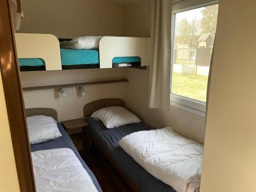 Voodi või voodid majutusasutuse Vorbasse camping toas