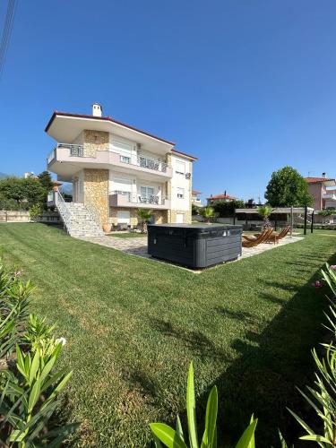Κήπος έξω από το Villa Hana