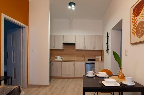Η κουζίνα ή μικρή κουζίνα στο Apartamenty Emilia 2