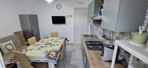 Kuchyň nebo kuchyňský kout v ubytování La casa di San Pio X