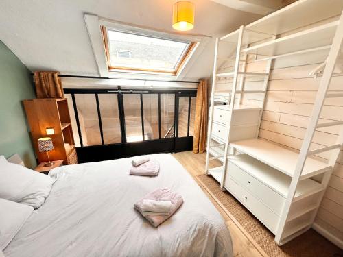 Posteľ alebo postele v izbe v ubytovaní TiLaouen - Location de vacances, idéalement située au port de Vannes !