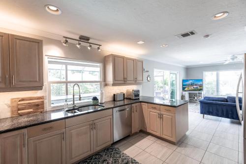 a kitchen with a sink and a counter top at Siesta Key Island Rentals in Siesta Key
