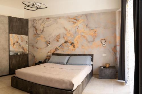 Ένα ή περισσότερα κρεβάτια σε δωμάτιο στο La Maison de Giò