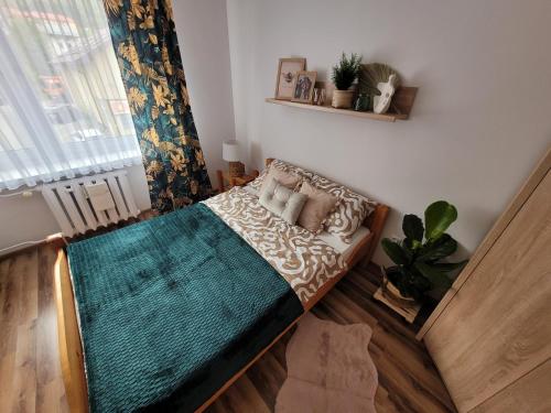 Ένα ή περισσότερα κρεβάτια σε δωμάτιο στο Farmer's House