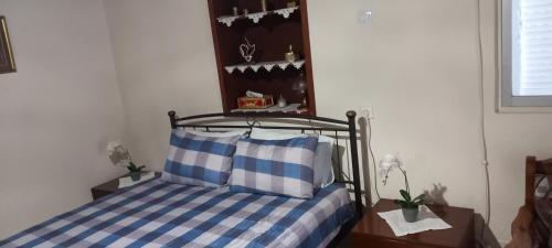 Ένα ή περισσότερα κρεβάτια σε δωμάτιο στο Grand Anny's Home