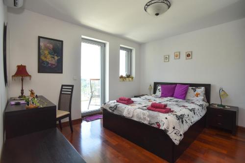 Krevet ili kreveti u jedinici u okviru objekta Panoramatic apartment
