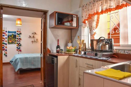 Η κουζίνα ή μικρή κουζίνα στο Apu House Minidepartamento