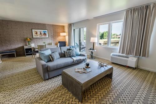 a living room with a couch and a table at Snow King Resort in Jackson