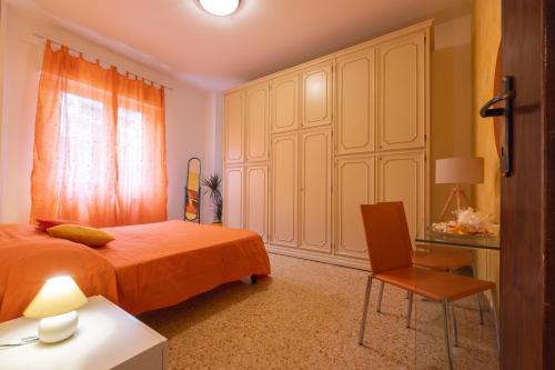 Ένα ή περισσότερα κρεβάτια σε δωμάτιο στο La Casa di Azzurra Cod.Citra 011015-LT-0171