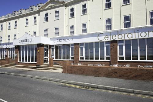 a building on the side of a street at Carousel Hotel in Blackpool