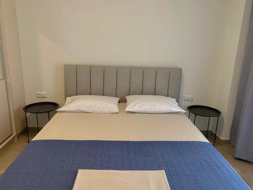 Ένα ή περισσότερα κρεβάτια σε δωμάτιο στο Horizon Blu Blu apartment