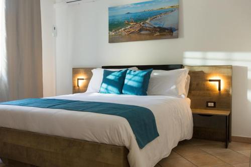 Ένα ή περισσότερα κρεβάτια σε δωμάτιο στο Isola Suite