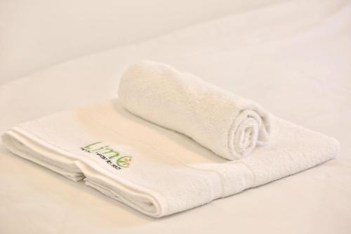 a white towel sitting on top of a table at Luxury apartment on the beach in Haifa