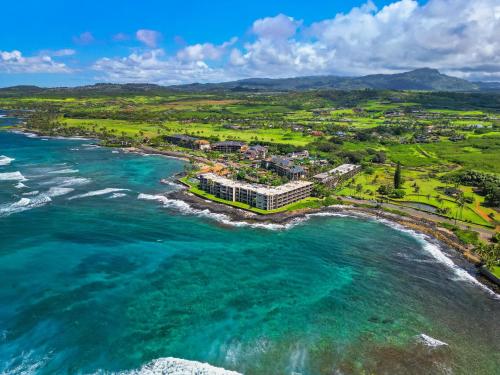 an aerial view of a resort on the beach at Kuhio Shores 215 in Koloa