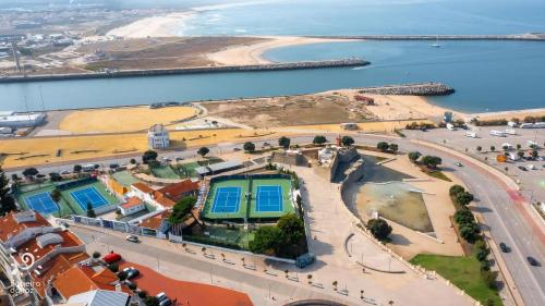 an aerial view of a city and the ocean at Casa Alto Do Viso in Figueira da Foz